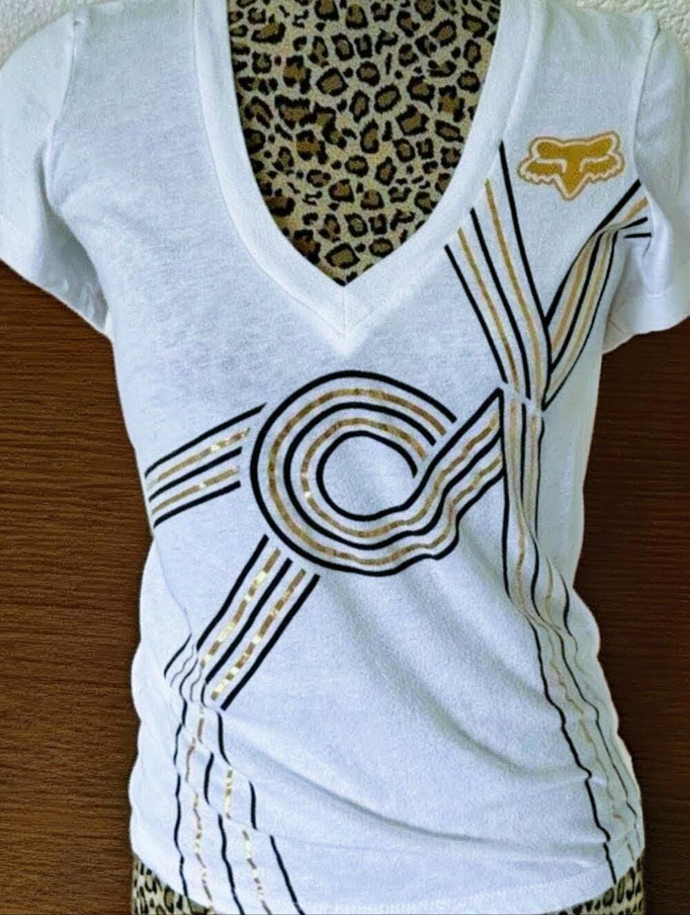 Fox White V-Neck Tee with Gold Graphic Stripes